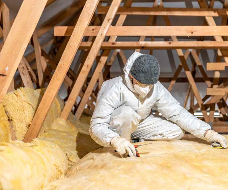 Loft insulation installers London - professional insulation work in a loft space